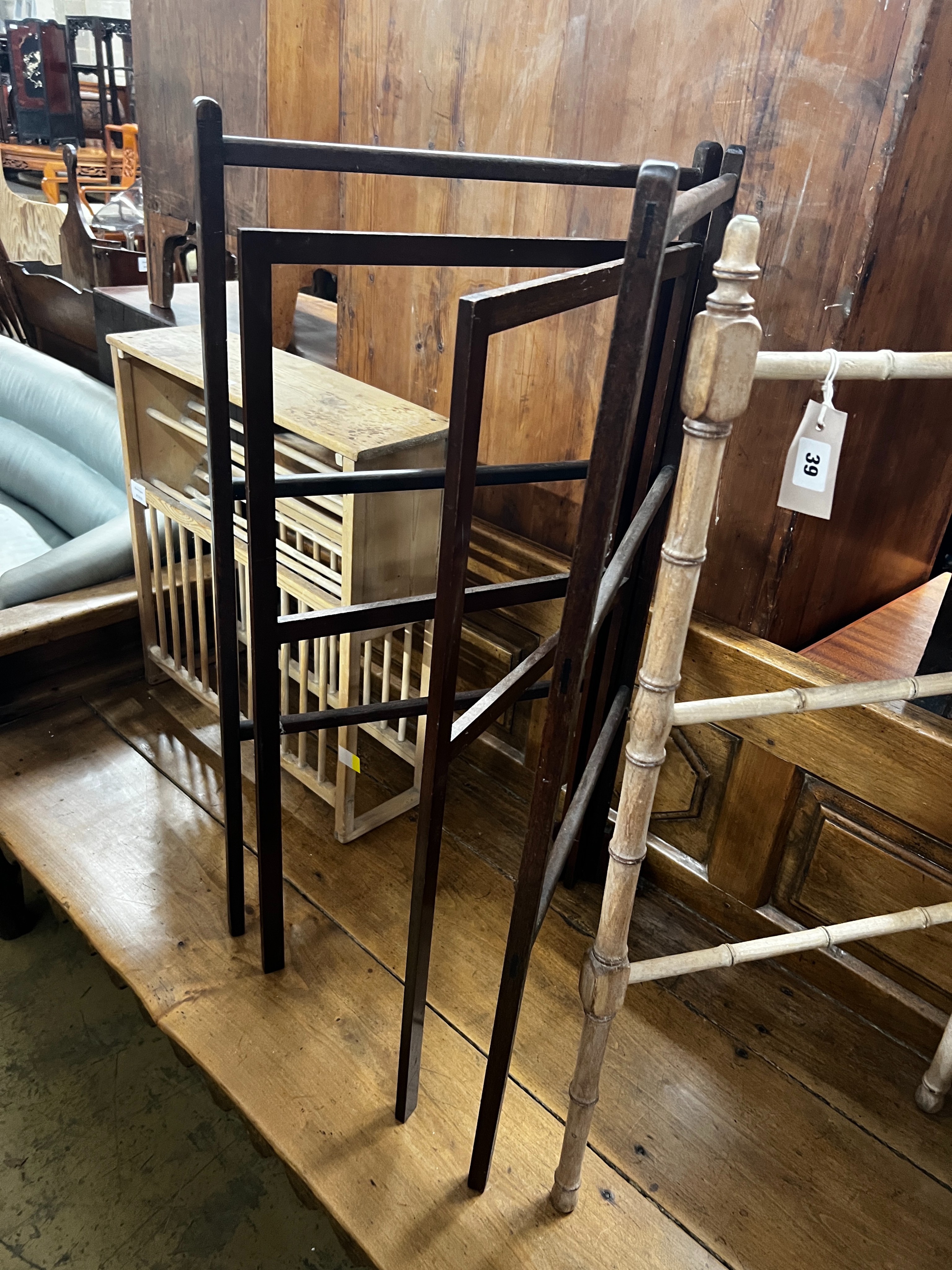 A 19th century faux bamboo folding towel rail together with two mahogany towel rails, largest height 92cm